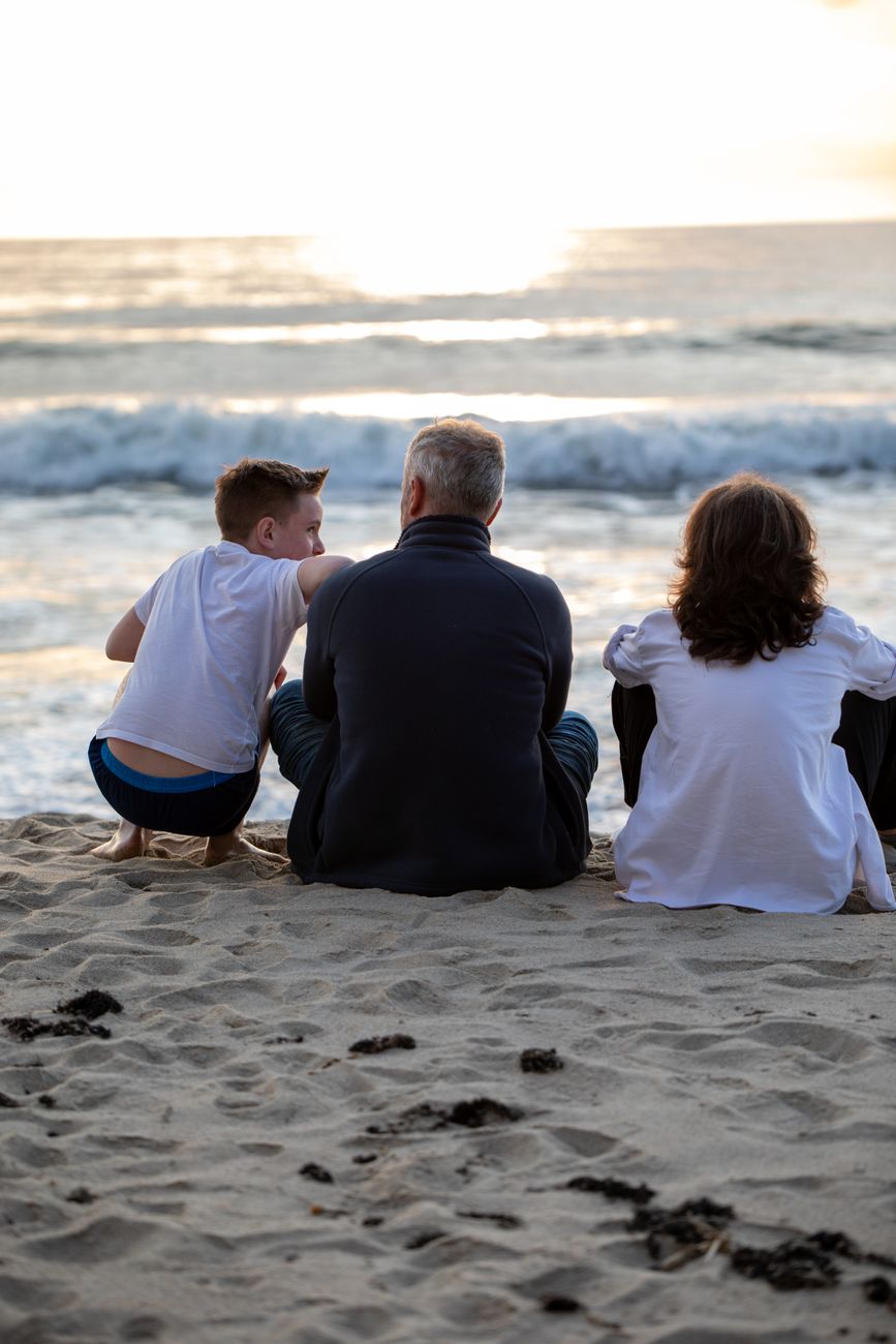 family bonding at sunset beach